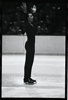 Figure Skater Tim Woods with His Arms Raised
