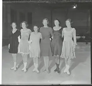 Graceful Prints: Figure Skaters Posing During Practice