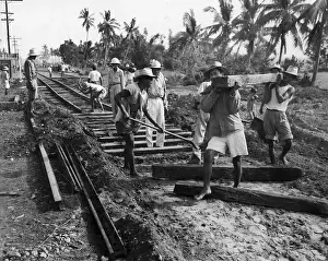 Repairing Prints: Filipinos Repairing Railroad on Luzon