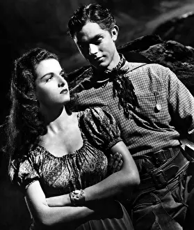Prints of Actress Jane Russell and actor Jack Buetel in a portrait session for the movie 'The Outlaw' which was released on February 5, 1943. (Photo by Donaldson Collection/Getty Images) Hollywood's Sultry Siren – A Photographic Tribute: Film Still from 'The Outlaw'