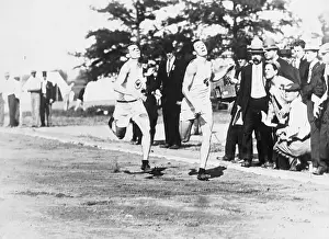 Prints of (Original Caption). Olympic Games, London, England 1908- Finish of the 200 meter race. Left to right: Robert Cloughen, U.S.A. Robert Kerr, Canada and Nathaniel Cartmel, U.S.A Capturing Glory: A Journey Through Olympic History: Finish of 200 Meter Race