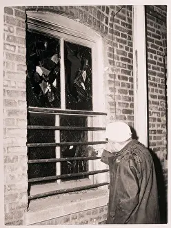 Bars Prints: Firefighter Examining Bars over Window
