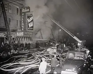Fire Hose Prints: Firefighters Battle Building Fire