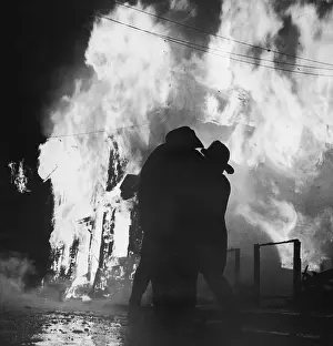 Suspicion Prints: Firefighters Trying to Control Newark Fires