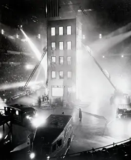 Glare Prints: Firefighting Demonstration with Replica of Burning Building
