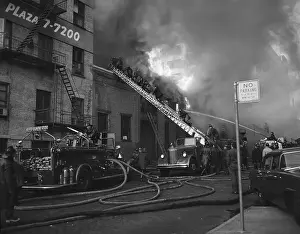 Fire Engine Prints: Firemen On Truck Ladder @ Burning Bldg