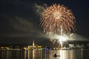 Fireworks during the Hausherrenfest festival, couple on a floating island in Lake Constance at the front, Radolfzell