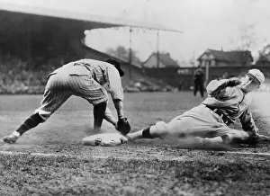 Prints of circa 1925: Detroit Tigers outfielder Ty Cobb slides into first base while a firstbaseman tries to tag him during a game in a stadium. (Photo by Hirz/Getty Images) MLB Legends Art Prints: Top 10 Greatest Baseball Players of All Time: First Base Fall