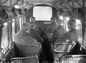 Prints of Passengers on a German airline watching the first ever in-flight film. (Photo by E Bacon/Getty Images) Topical Press Agency Prints: First Flying Cinema