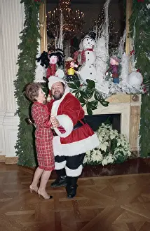 First Lady Nancy Reagan Dancing with Santa Claus