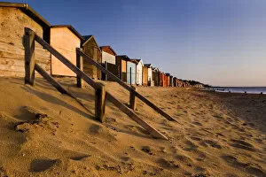 First light on Clacton Beach Huts in Essex