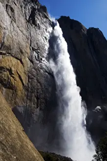 First light on Upper Yosemite Fall at peak flow in the spring in Yosemite National Park, CA