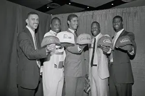 First Five Picks of College Player Draft Displaying Hats