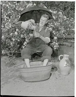 Fisherman Pouring Himself a Drink