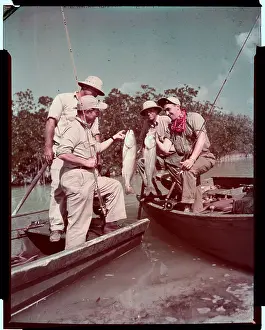 Fishermen Displaying Red Fish and Snook