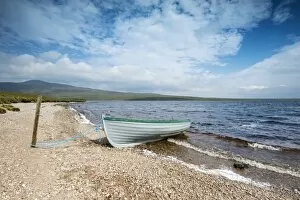 Fishing boat on the shore of Loch Loyal, Sutherland, Scotland, Great Britain, Europe