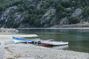 Fishing boats on the shore of Lago Bertrand at the mouth of Baker River, Bertrand, Aysen, Chile