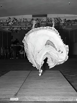Flamenco Dancer Waving Skirts