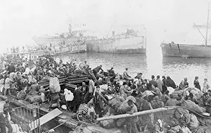 Fleeing Victims of Fire Crowded on Shore
