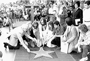 Prints of HOLLYWOOD, CA - OCTOBER 10: Christine McVie, John McVie, Mick Fleetwood, Stevie Nicks and Lindsay Buckingham of Fleetwood Mac receive their star on the Hollywood Walk of Fame on October 10 Go Your Own Way: A Visual Celebration of Rock’s Most Enchanting and Enduring Band: Fleetwood Mac