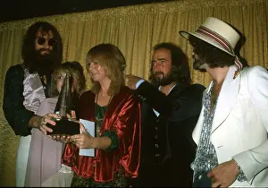 Prints of SANTA MONICA, CA - JANUARY 16: Fleetwood Mac (L-R Mick Fleetwood, Stevie Nicks, Christine McVie) Go Your Own Way: A Visual Celebration of Rock’s Most Enchanting and Enduring Band: Fleetwood Mac At The AMA's