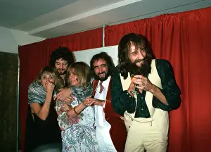 Prints of LOS ANGELES - SEPTEMBER 1: Fleetwood Mac (L-R Stevie Nicks, Lindsey Buckingham, Christine McVie, John McVie and Mick Fleetwood) backstage at the Los Angeles Rock Awards on September 1 Go Your Own Way: A Visual Celebration of Rock’s Most Enchanting and Enduring Band: Fleetwood Mac At The LA Rock Awards