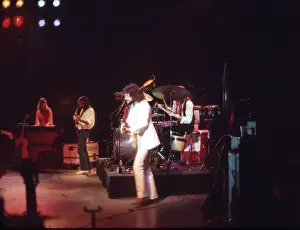 Prints of JULY 1977: Pianist and singer Christine McVie, bassist John McVie, guitarist Lindsey Buckingham and drummer Mick Fleetwood of the rock group Fleetwood Mac perform onstage in July 1977 Go Your Own Way: A Visual Celebration of Rock’s Most Enchanting and Enduring Band: Fleetwood Mac Performing