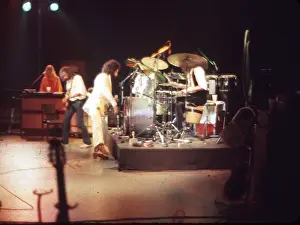 Prints of JULY 1977: Pianist and singer Christine McVie, bassist John McVie, guitarist Lindsey Buckingham and drummer Mick Fleetwood of the rock group Fleetwood Mac perform onstage in July 1977 Go Your Own Way: A Visual Celebration of Rock’s Most Enchanting and Enduring Band: Fleetwood Mac Performing
