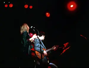 Prints of OCTOBER 1977: Singer Christine McVie and guitarist Lindsey Buckingham of the rock group Fleetwood Mac perform onstage in October 1977. (Photo by Michael Ochs Archives/Getty Images) Go Your Own Way: A Visual Celebration of Rock’s Most Enchanting and Enduring Band: Fleetwood Mac Performing