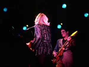 Prints of OCTOBER 1977: Singer Christine McVie and guitarist Lindsey Buckingham of the rock group Fleetwood Mac perform onstage in October 1977. (Photo by Michael Ochs Archives/Getty Images) Go Your Own Way: A Visual Celebration of Rock’s Most Enchanting and Enduring Band: Fleetwood Mac Performing