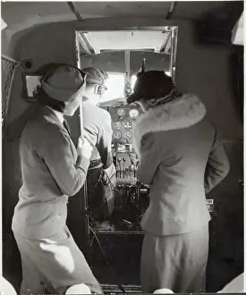 Cockpit Prints: Flight Attendant Shows Woman Cockpit