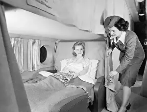 Boeing Prints: Flight Attendant W/Reclining Passenger