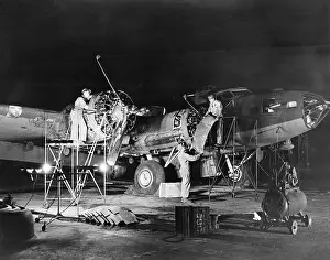 Flight Student Officers with Military Airplane
