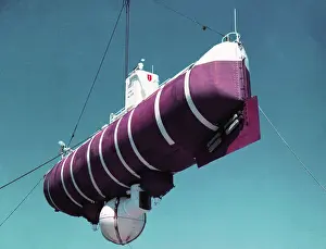 A Floating Crane Lifting a Bathyscaph