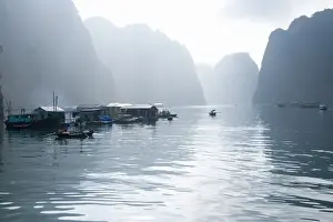 Steep Prints: Floating Vietnamese fishing village with rocky coastline