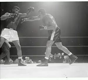 Floyd Paterson Ducking Punch from Archie Moore