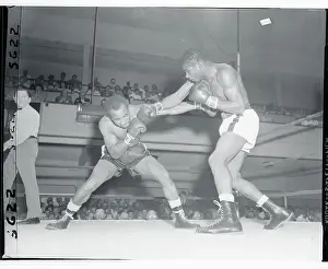 Floyd Patterson Boxing Against Esau Ferdinand