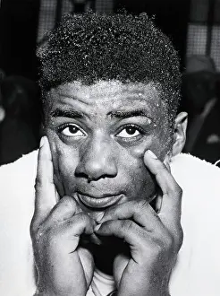 Sweating Prints: Floyd Patterson With Hands At Face