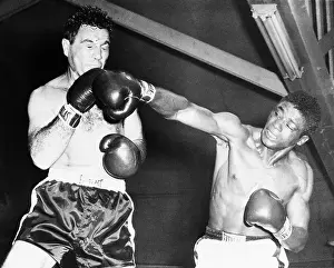 Floyd Patterson Punches Joey Maxim