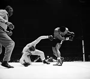 Floyd Patterson Punches Tom McNeeley in Ring