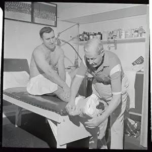 Floyd Smith Being Treated by Harry Watmuff