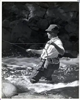 Trout Prints: Fly Fisherman in Trout Stream