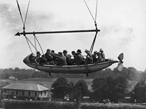 Prints of 6th June 1926: Visitors enjoying an exhilarating ride through space on The Captive Flying Machine, a fairground ride designed by Sir Hiram Maxim at Crystal Palace, south London Topical Press Agency Prints: Flying Machine