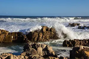 Resort Prints: Foamy waves roll over rugged rocks off the point at the popular holiday resort of Buffalo Bay
