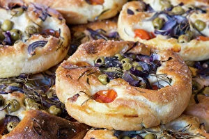Food Gallery: Focaccia, Italian flat bread made from yeast yeast dough with herbs, tomatoes and olives