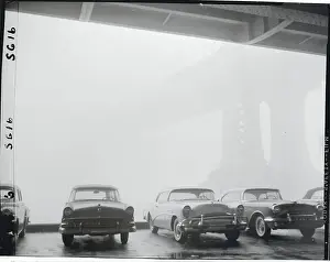 Fog Blanketing a Bridge and Cars