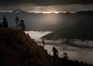 Fog over a valley in Tibet