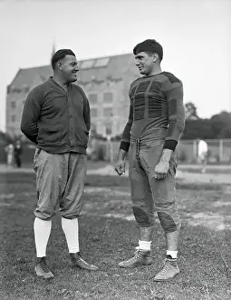 Football Coach and Captain Conversing