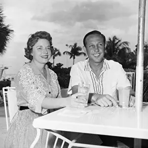 Football Commissioner and Wife Enjoying Miami Beach