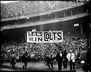 Football Fans Displaying Sign